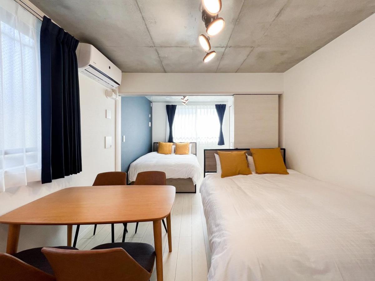 Apartament Wellsquareism Honancho